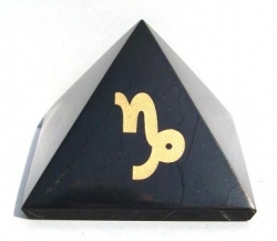 Shungit pyramid with sign of Capricorn